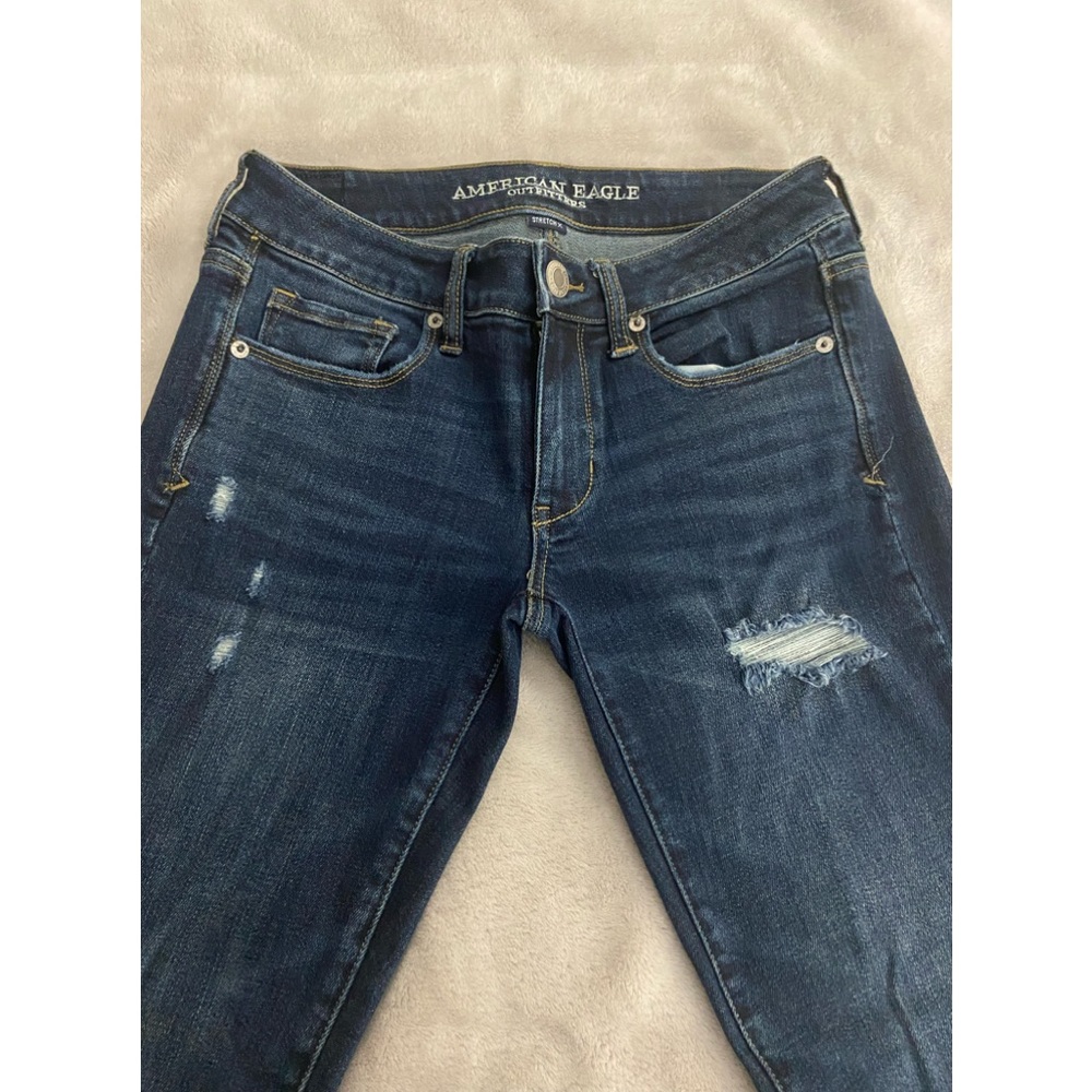 EUC American Eagle DESTROYED BOOT LEG JEANS SIZE 4